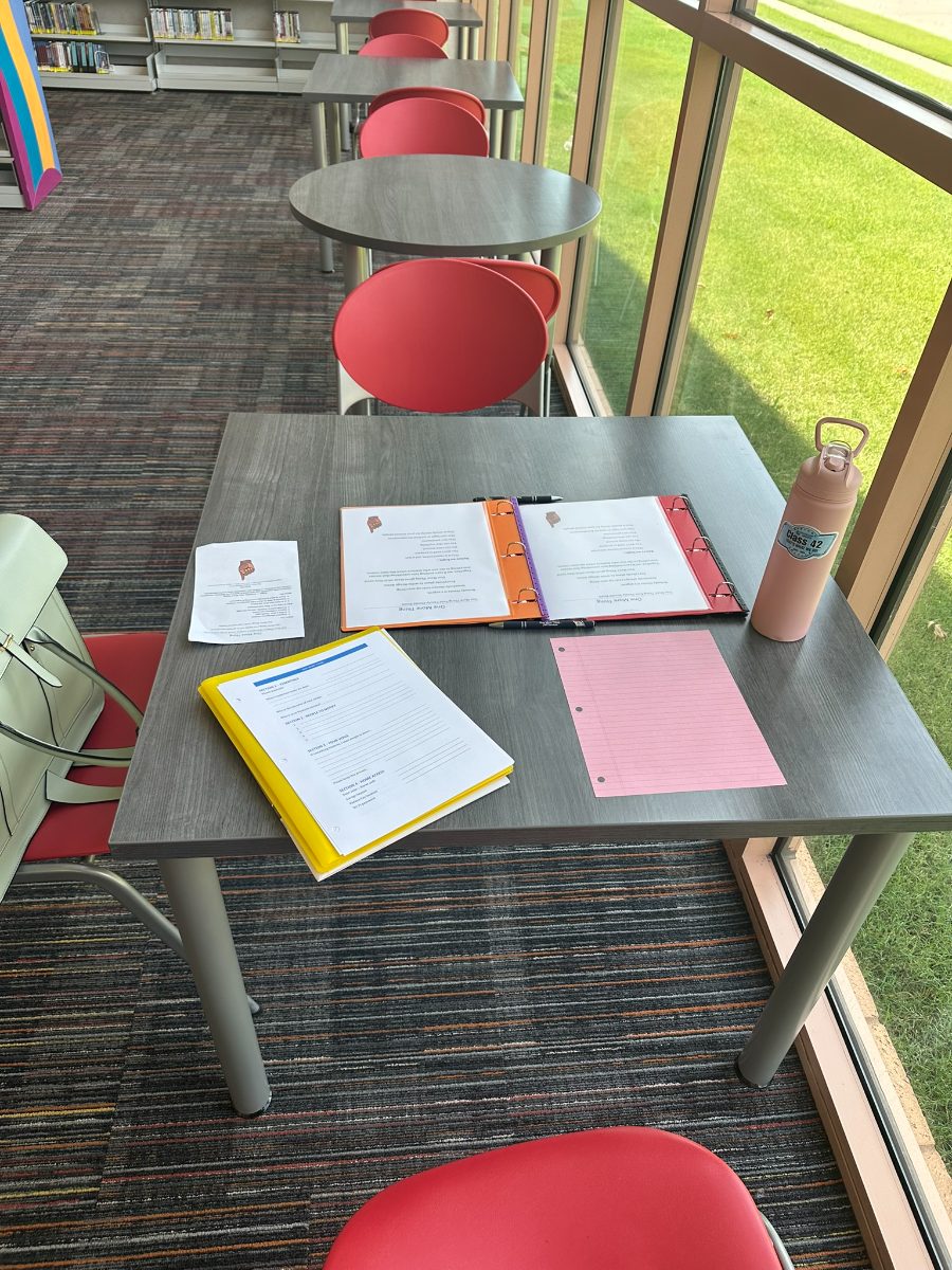 An OMT Access Plan binder and intake materials, ready to go